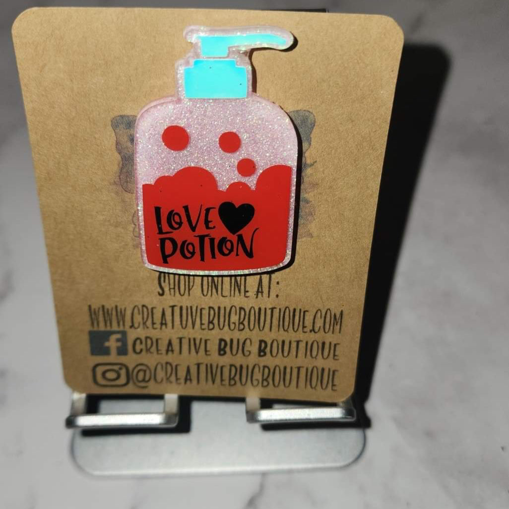 Love Potion Bottle Badge Reel