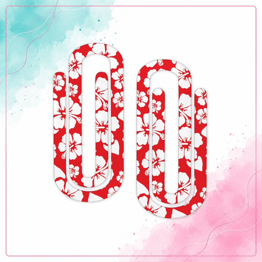Two red jumbo acrylic paper clips with a bold white hibiscus flower pattern