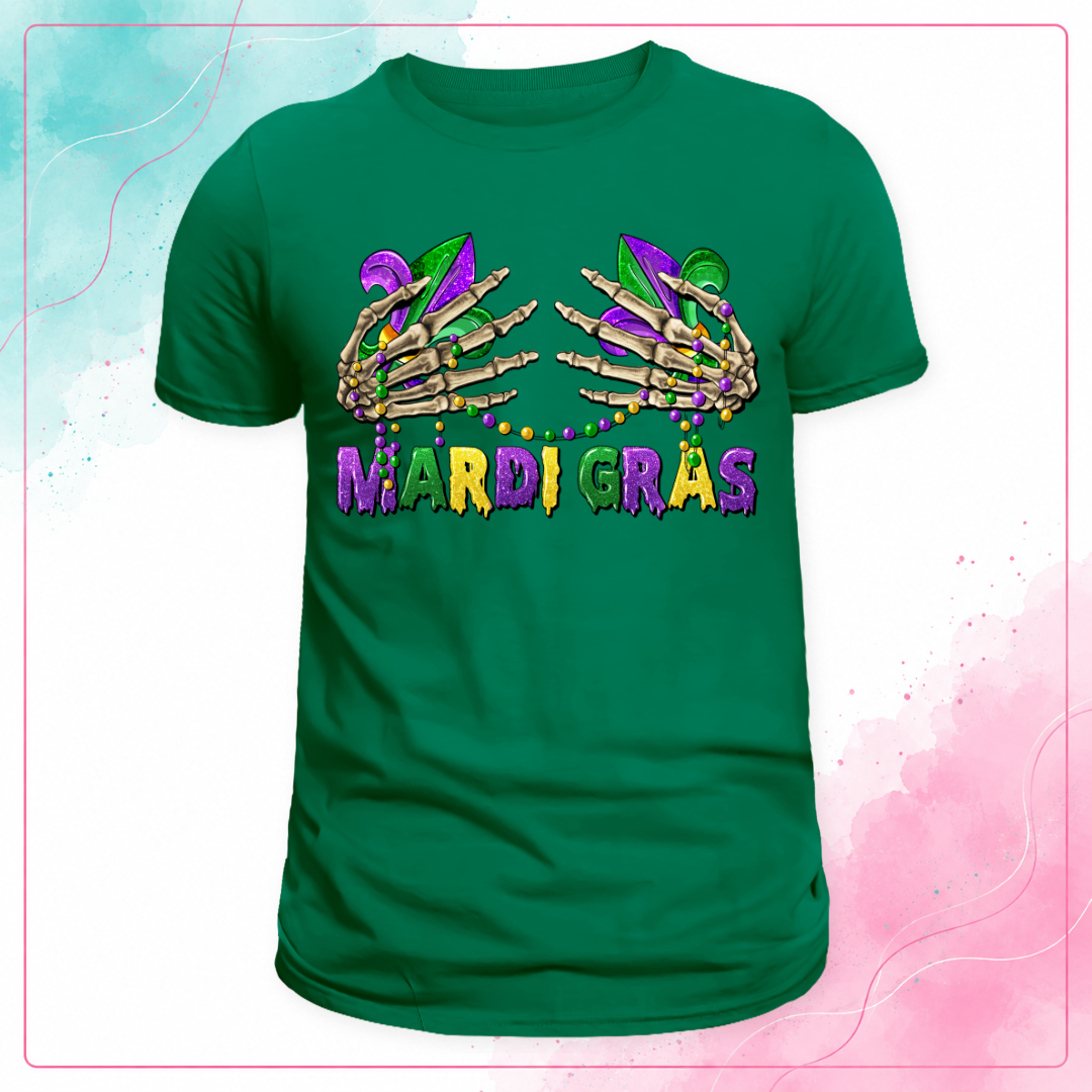 Green Mardi Gras T-shirt with skeleton hands, fleur-de-lis, bead necklaces, and purple, green, and gold lettering.