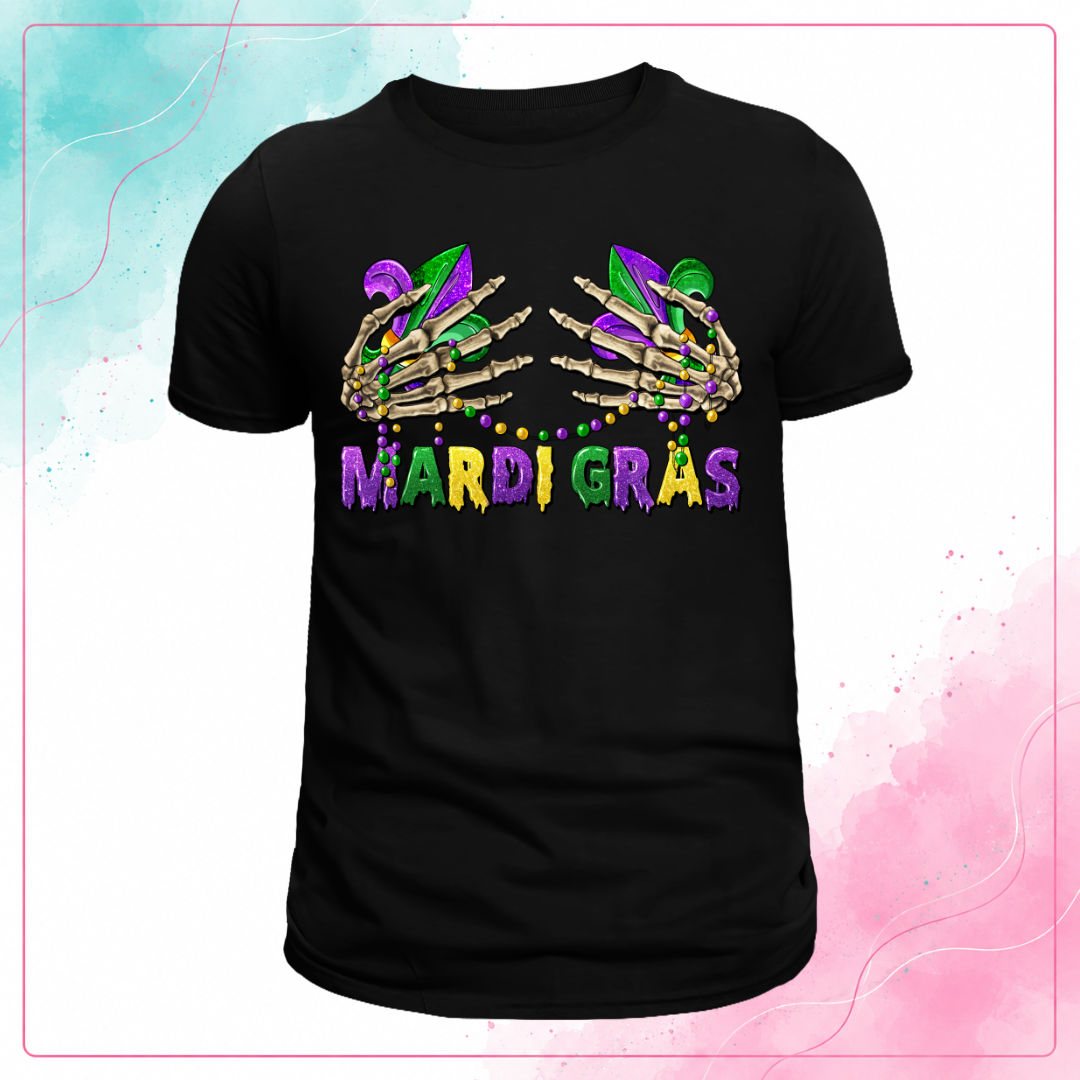 Black Mardi Gras T-shirt with skeleton hands holding fleur-de-lis and draped beads above purple, green, and gold Mardi Gras lettering.