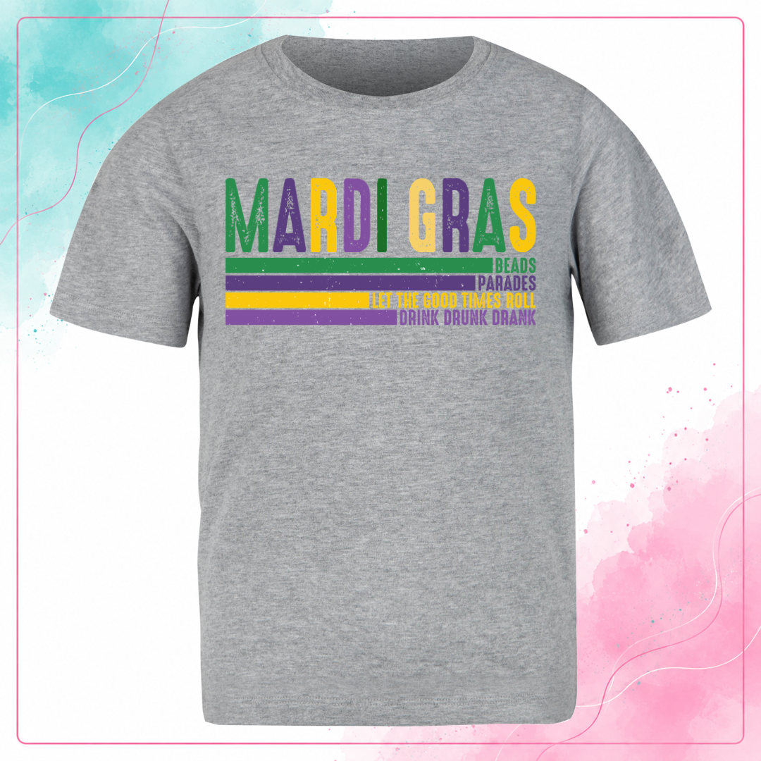 Gray Mardi Gras T-shirt with distressed purple, green, and gold lettering and horizontal slogan stripes.