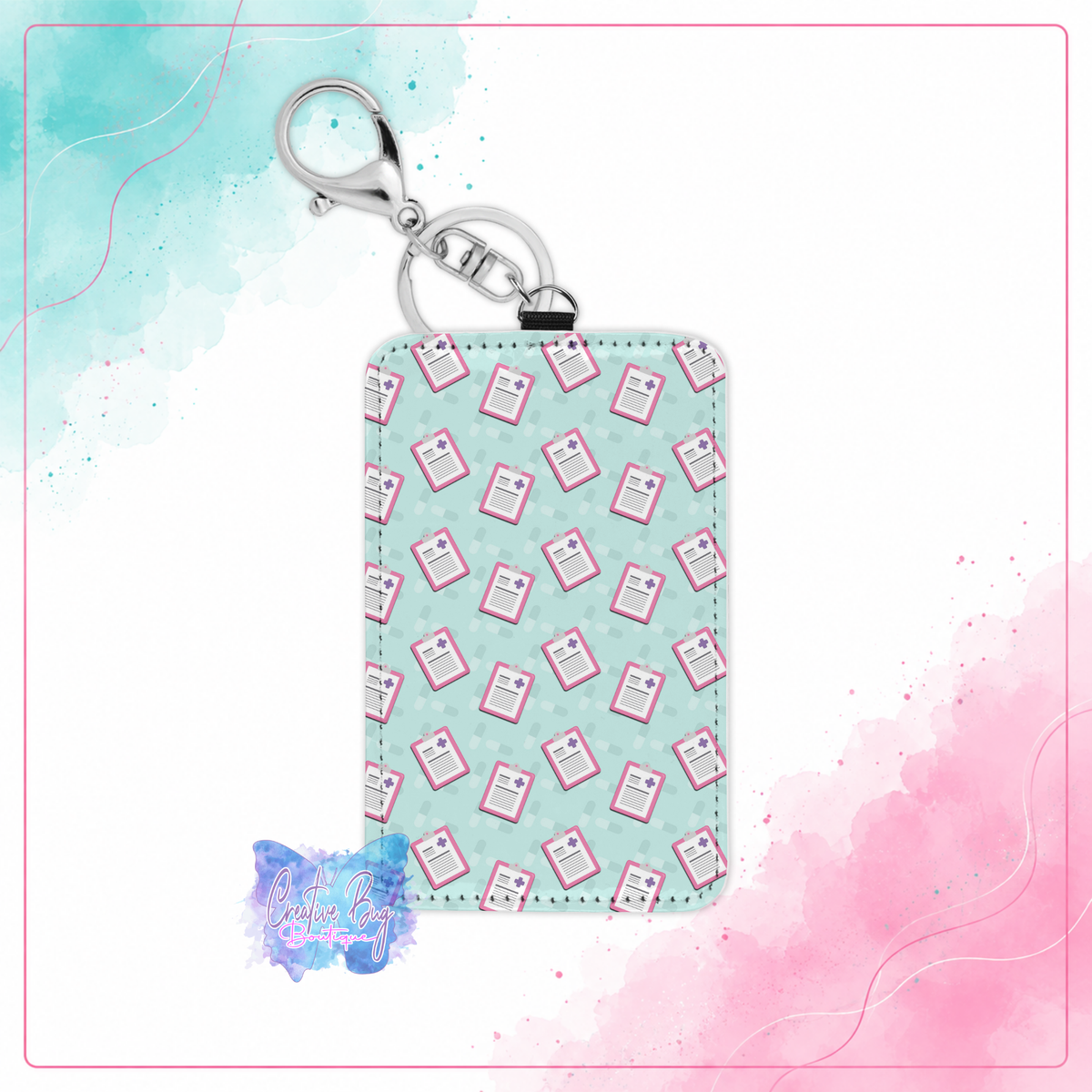 Healthcare clipboard keychain card holder with pink medical clipboards on a teal background
